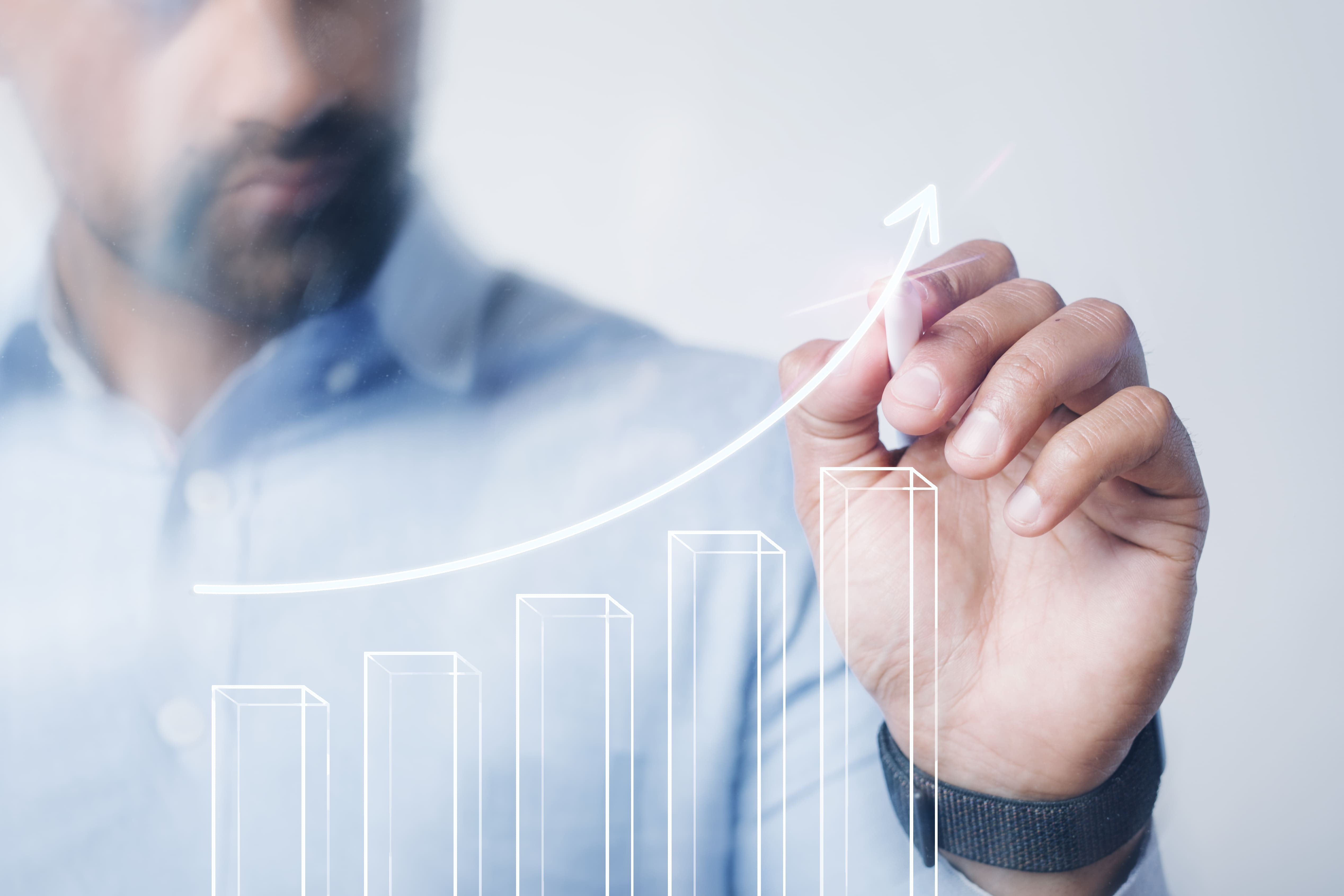 Professional analyzing data on laptop